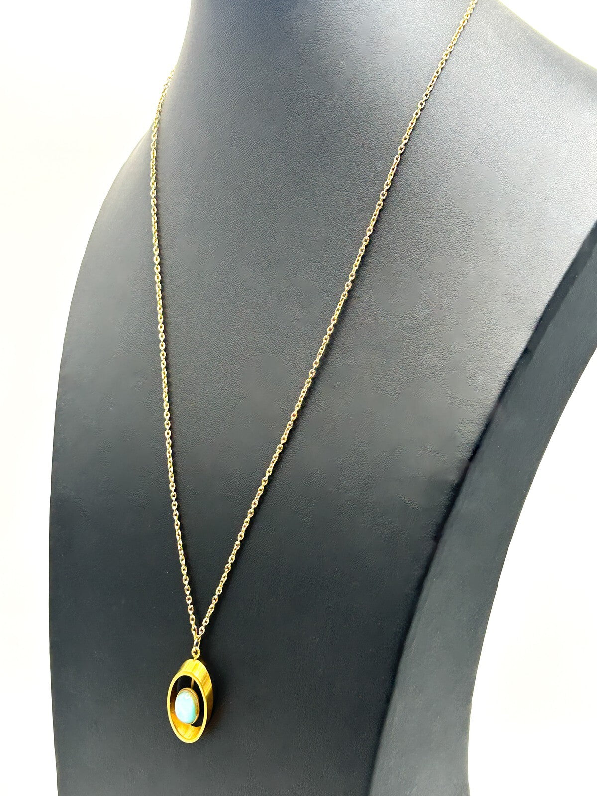 Gold Tone Openwork Oval Pendant Necklace with Turquoise Cats Eye Cabochon