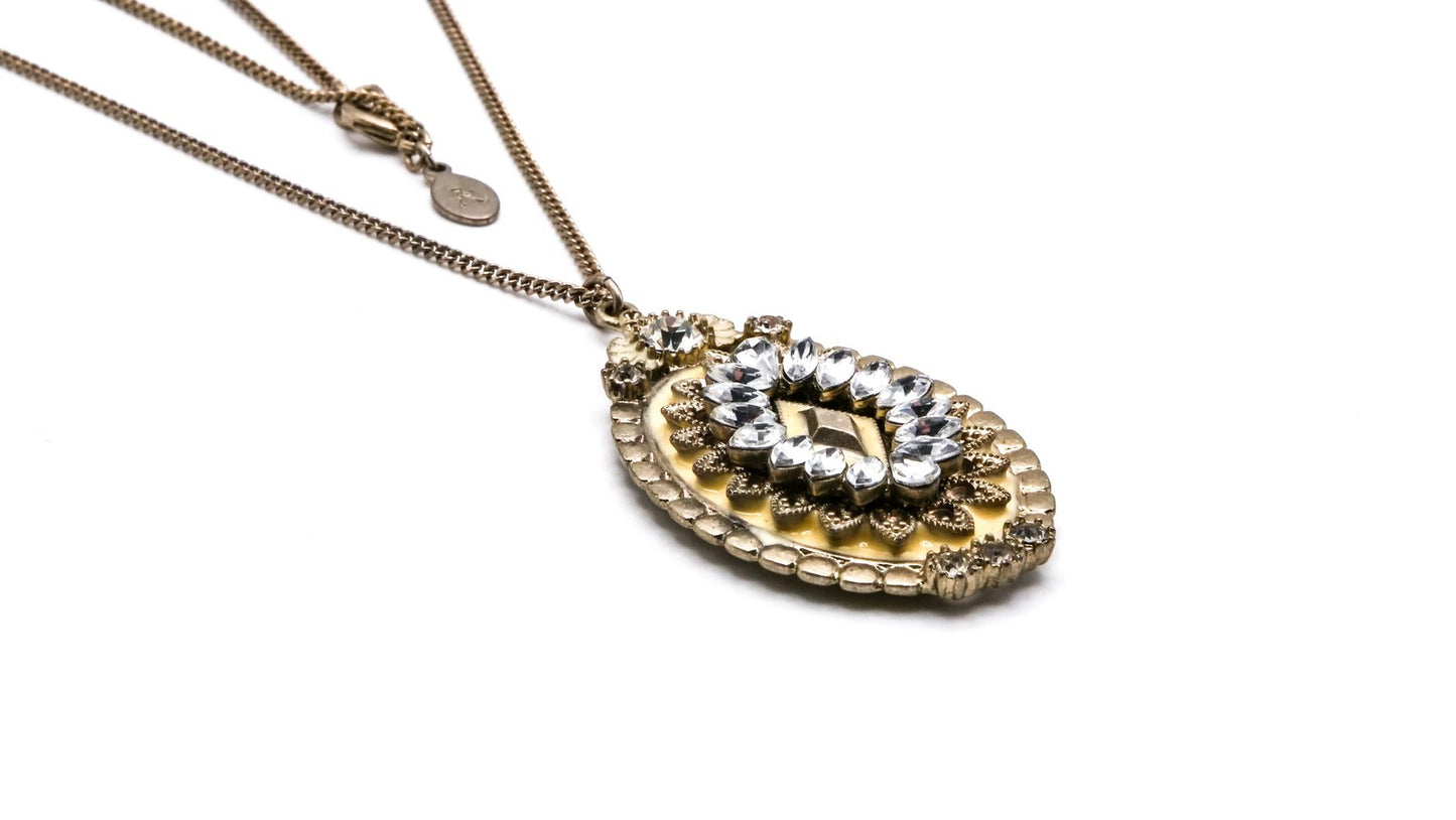 Oval Cream & Rhinestone Ornate Pendant | 33" Length, Gold Tone