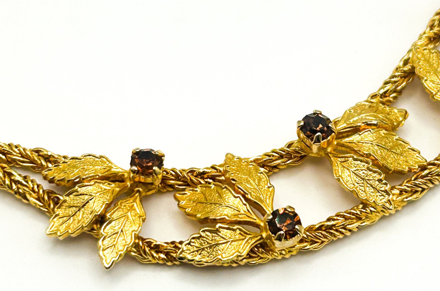 Pennino Gold Tone Leaf Statement Prong-set Faceted Garnet Stone Accent Necklace