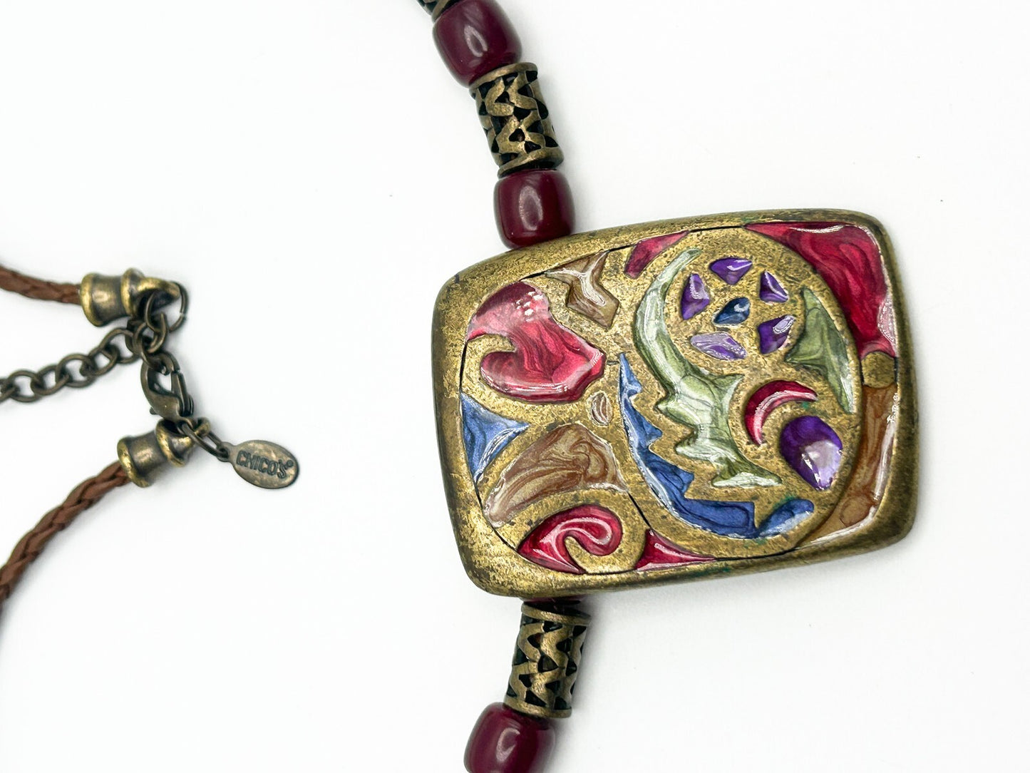 Chico’s Brass Tone Enamel Abstract Pendant Necklace on Braided Cord