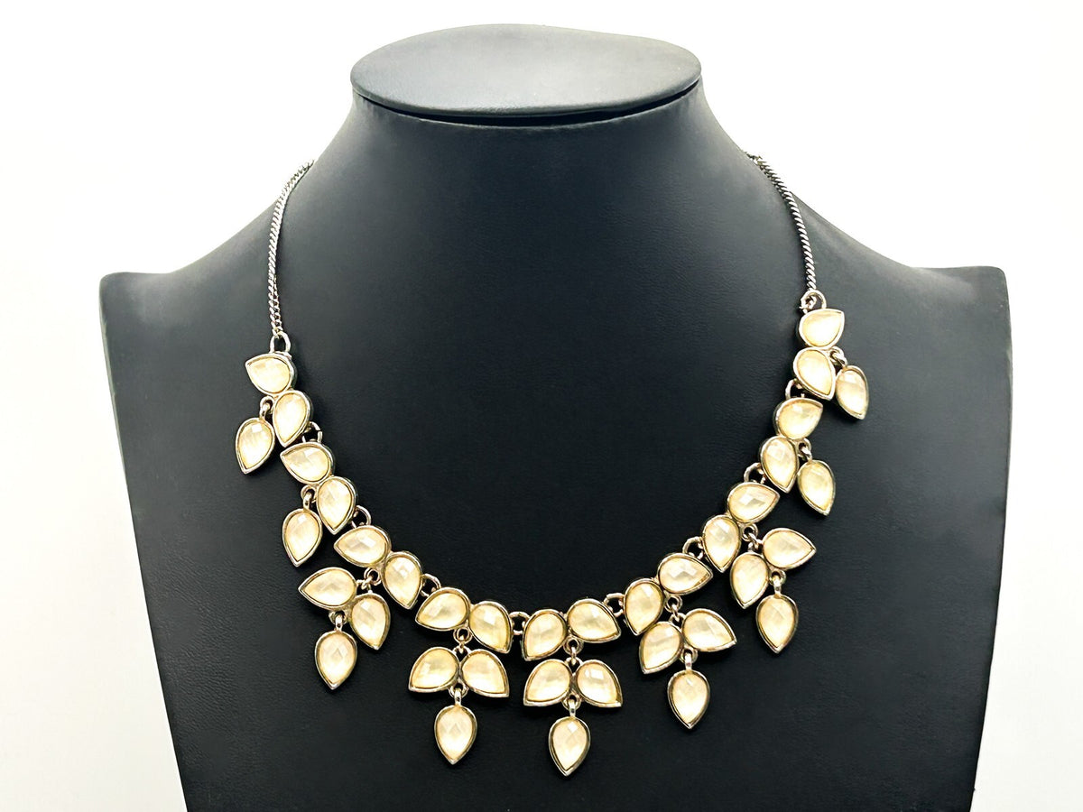 Accessorize Faceted Teardrop Statement Necklace – Champagne Acrylic Leaf Design