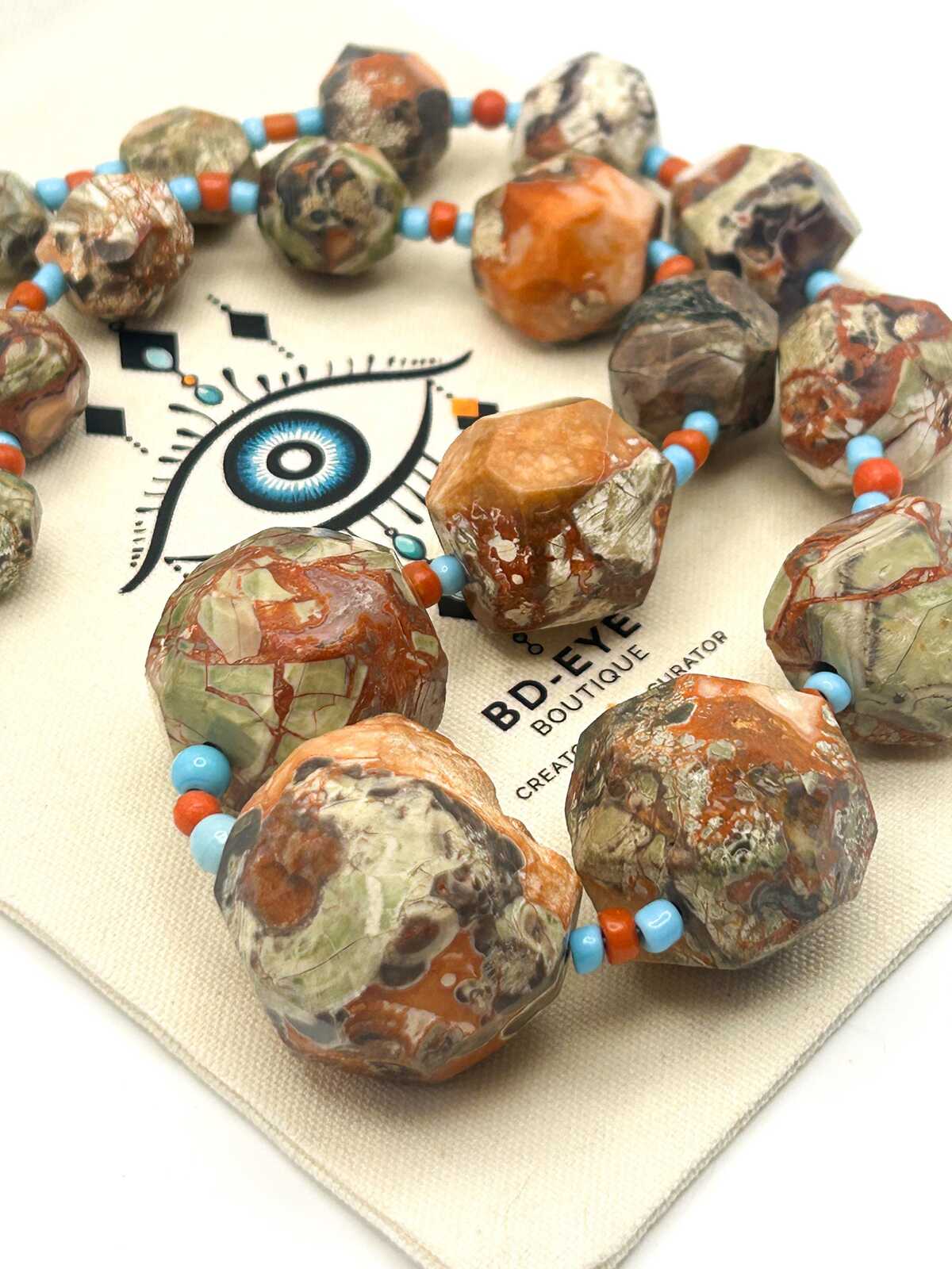 Graduated Raw & Faceted Jasper Statement Necklace with Blue and Red Glass Spacer