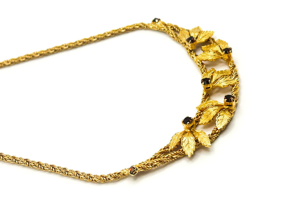 Pennino Gold Tone Leaf Statement Prong-set Faceted Garnet Stone Accent Necklace