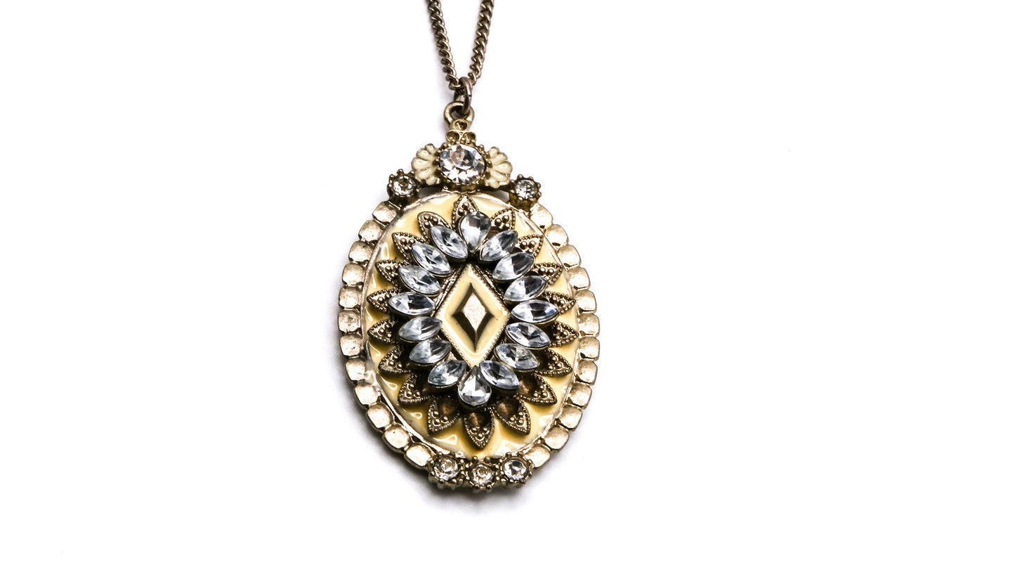 Oval Cream & Rhinestone Ornate Pendant | 33" Length, Gold Tone