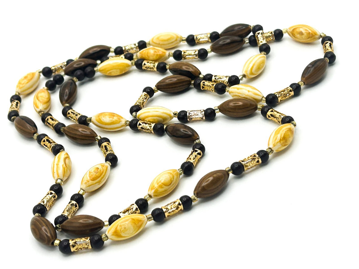 Vintage 70s Brown & Yellow Swirl and Gold Tone Openwork Tube Bead Long Necklace