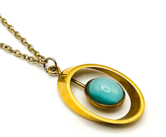 Gold Tone Openwork Oval Pendant Necklace with Turquoise Cats Eye Cabochon
