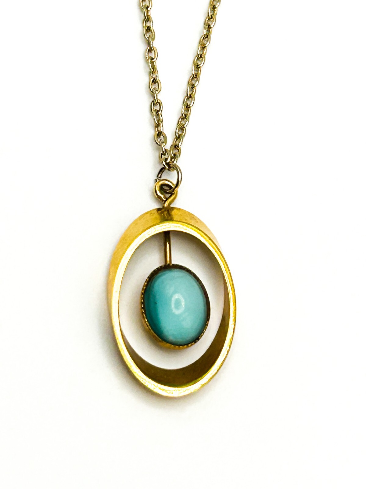 Gold Tone Openwork Oval Pendant Necklace with Turquoise Cats Eye Cabochon
