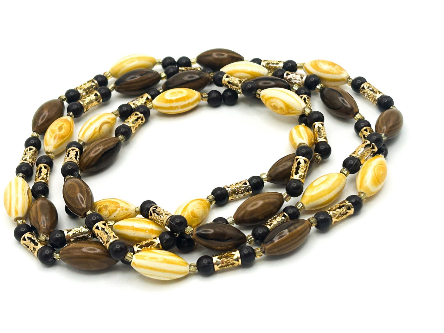 Vintage 70s Brown & Yellow Swirl and Gold Tone Openwork Tube Bead Long Necklace