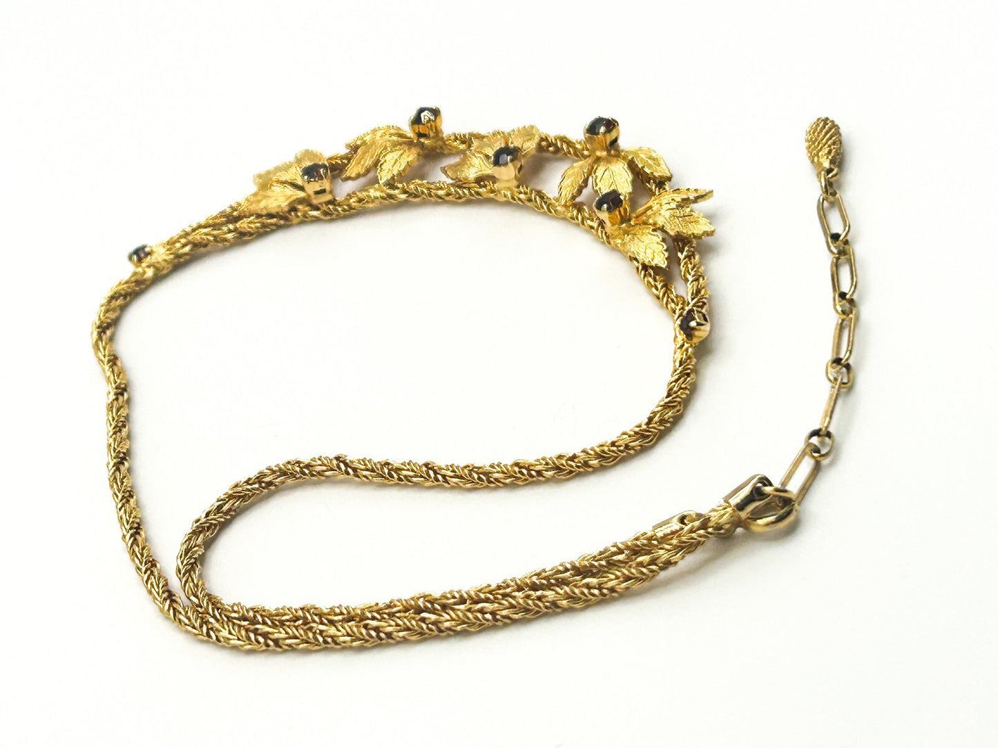 Pennino Gold Tone Leaf Statement Prong-set Faceted Garnet Stone Accent Necklace