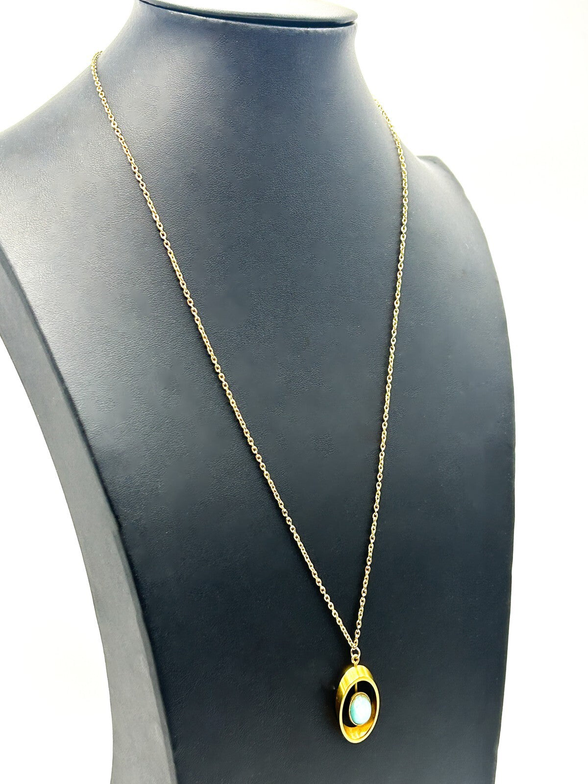 Gold Tone Openwork Oval Pendant Necklace with Turquoise Cats Eye Cabochon