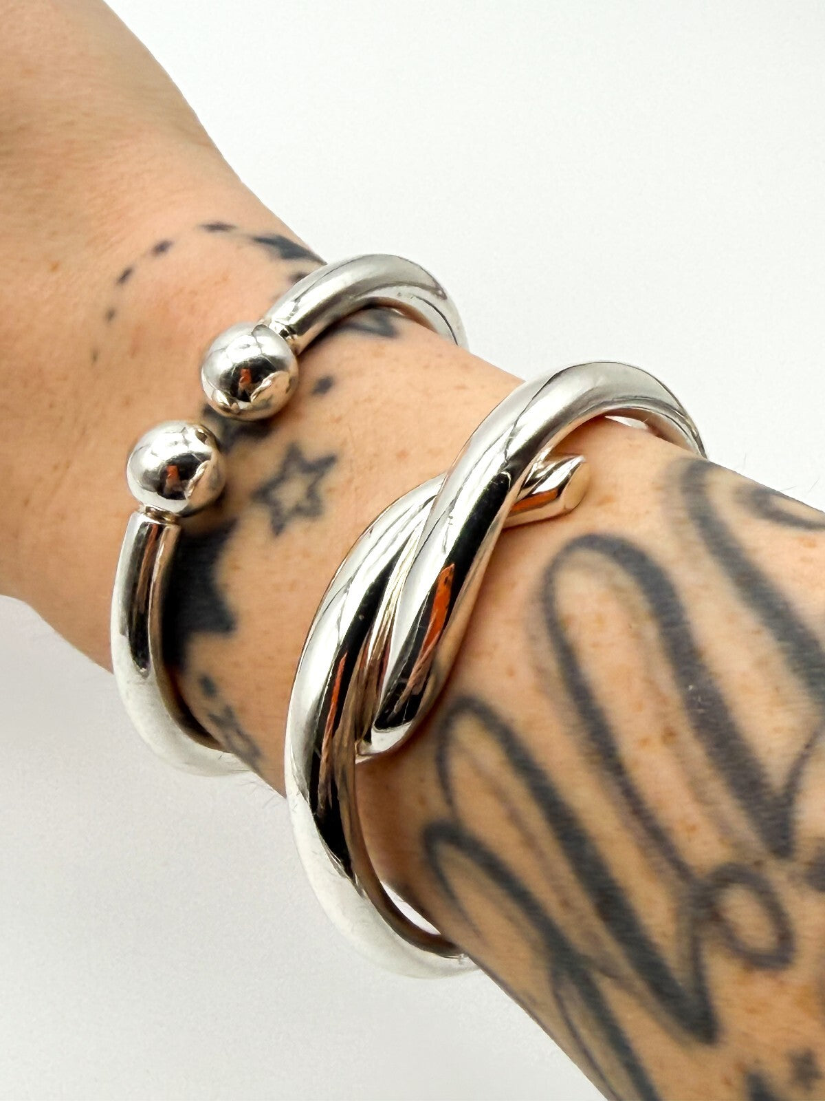 Silver Tone Hinged Bangle Bracelet Bundle Modern Torque and Knot Design x2