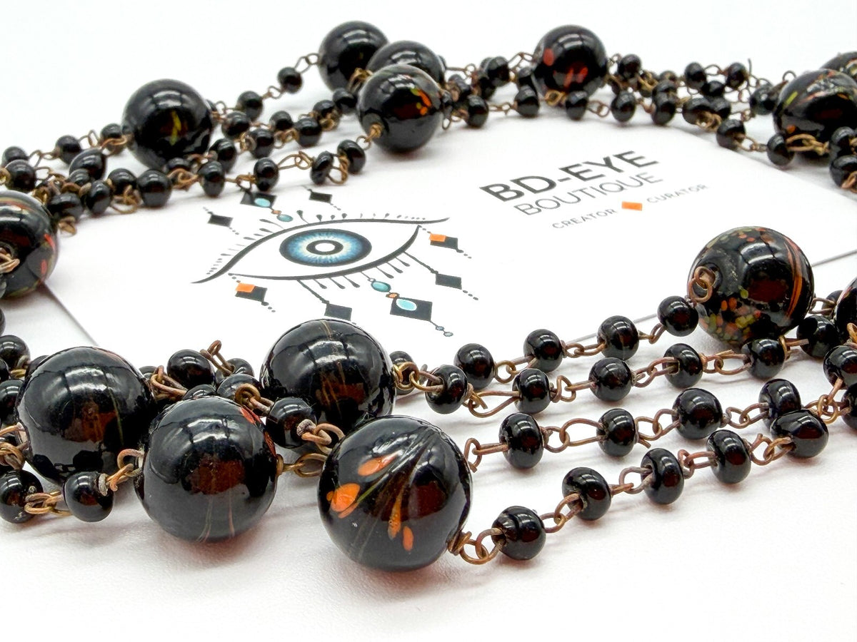Vintage Murano Art Glass Flapper Necklace Black Orange Green Swirl Beads 26.5”