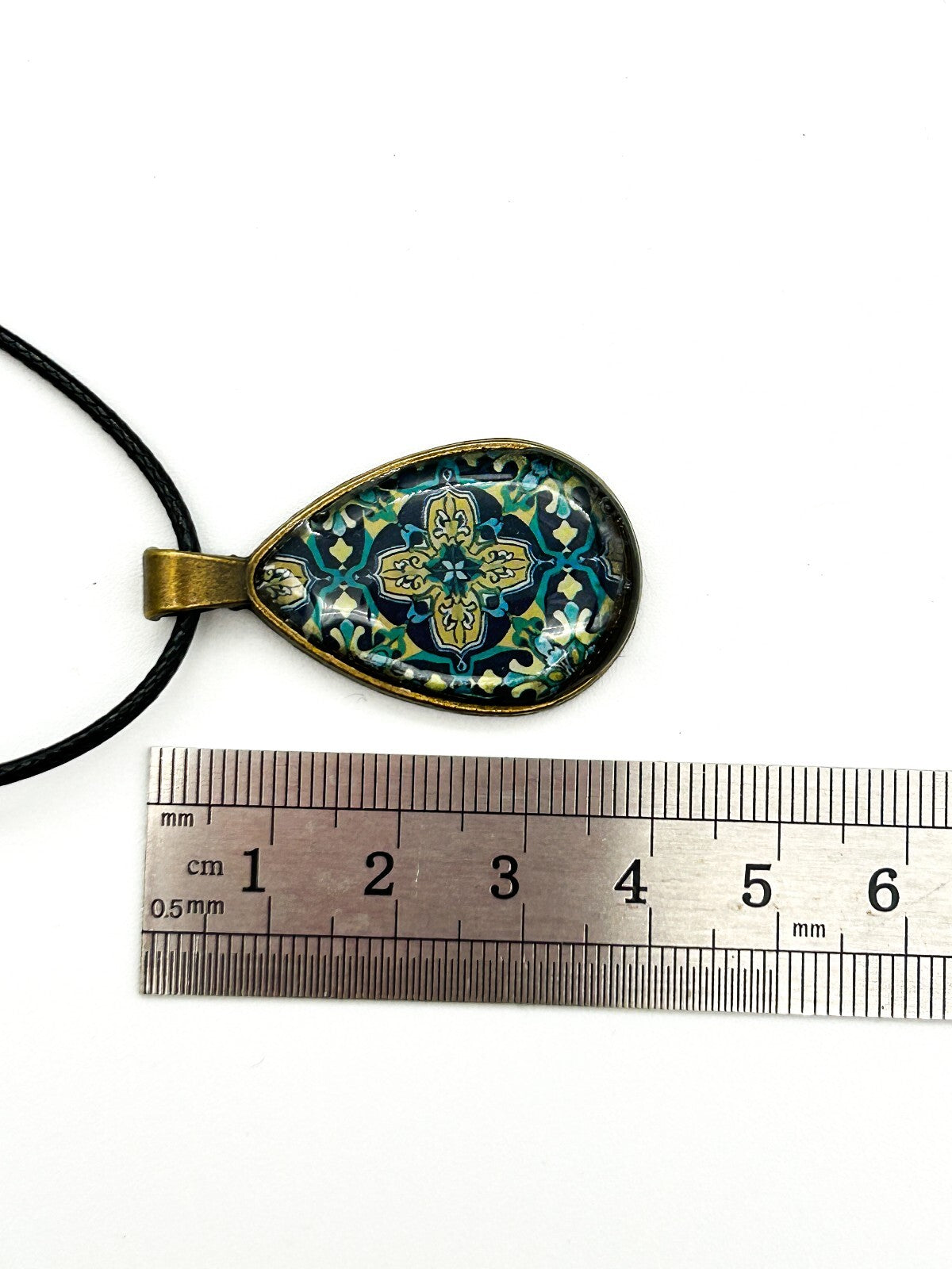 Brass Tone Floral Resin Teardrop Pendant Necklace Blue Geometric Pattern