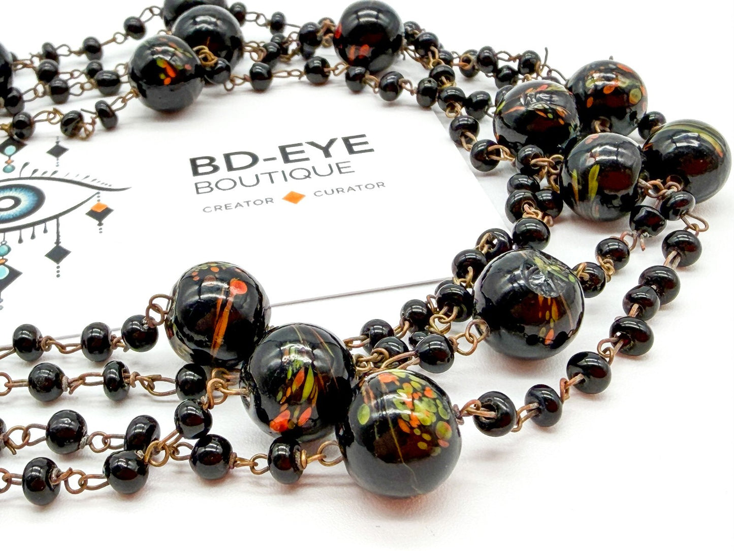 Vintage Murano Art Glass Flapper Necklace Black Orange Green Swirl Beads 26.5”