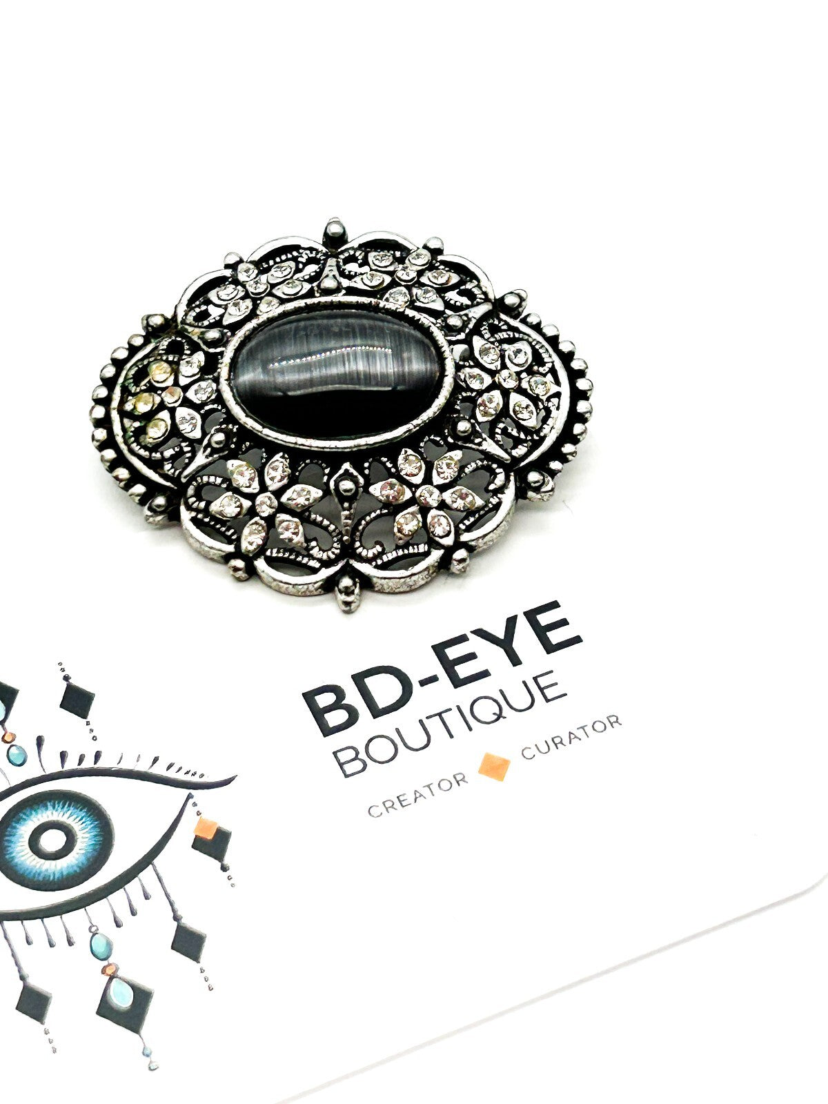 Vintage Style Ornate Cat’s Eye Brooch Grey Glass Cabochon Rhinestone Silver Tone