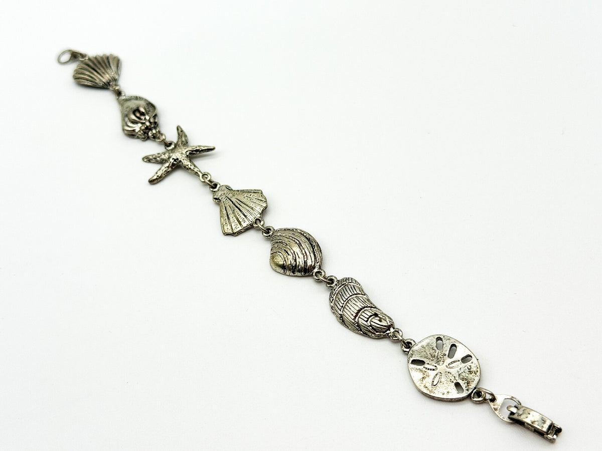 Signed SJ Silver Tone Beach Charm Bracelet Shell Starfish Nautical 7.5”