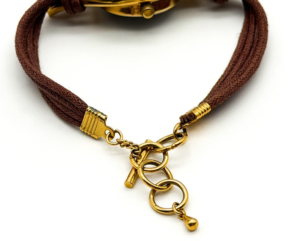 Avon Ladies Quartz Watch Gold Tone Brown Cord Strap Untested