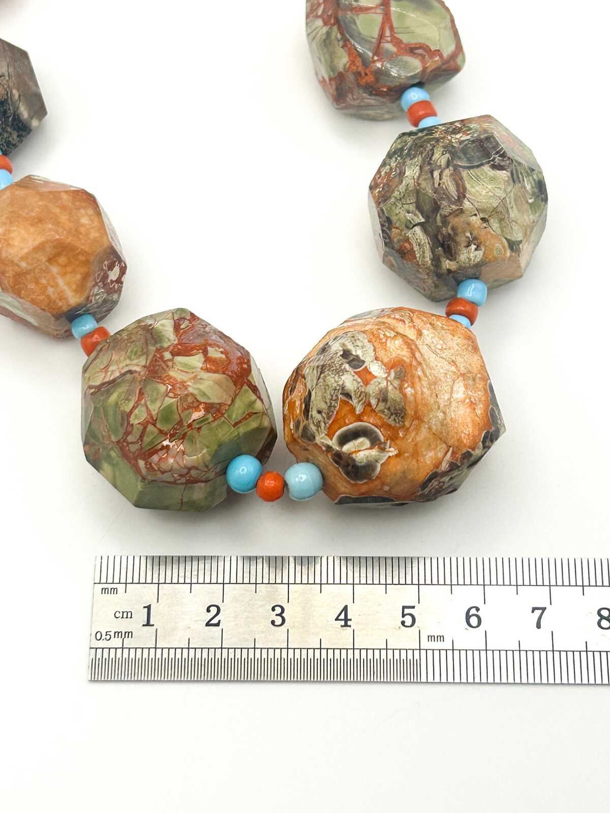 Graduated Raw & Faceted Jasper Statement Necklace with Blue and Red Glass Spacer