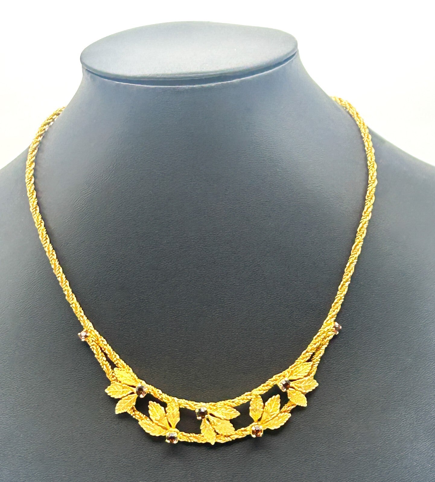 Pennino Gold Tone Leaf Statement Prong-set Faceted Garnet Stone Accent Necklace