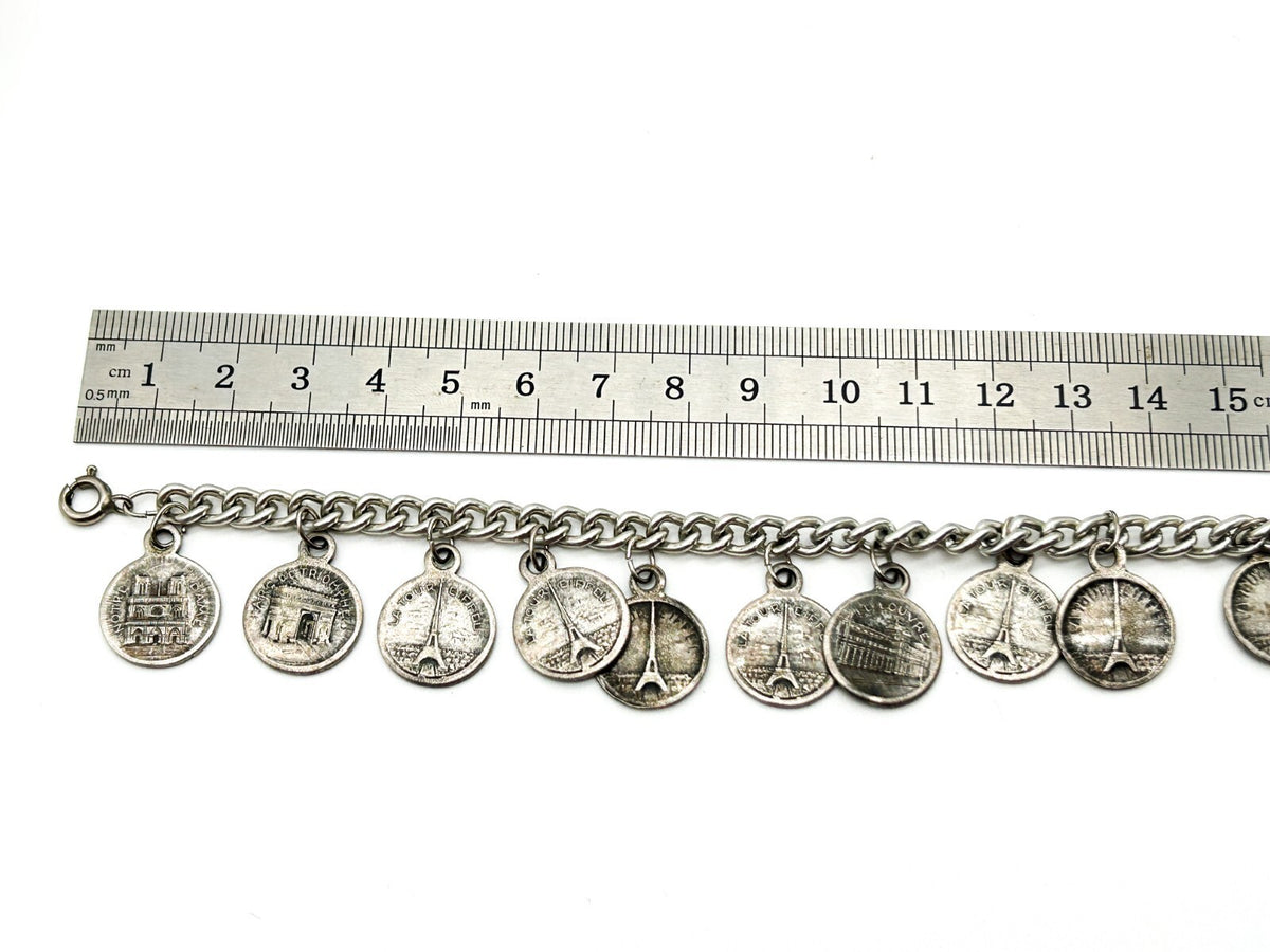 Vintage Paris Souvenir Coin Charm Bracelet with Eiffel Tower & Notre Dame Charms