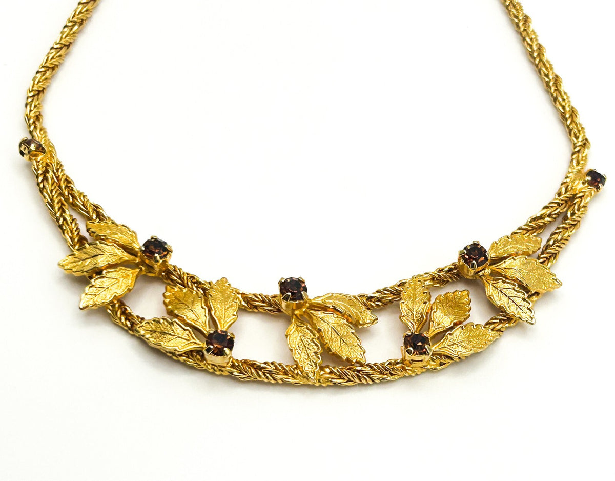 Pennino Gold Tone Leaf Statement Prong-set Faceted Garnet Stone Accent Necklace