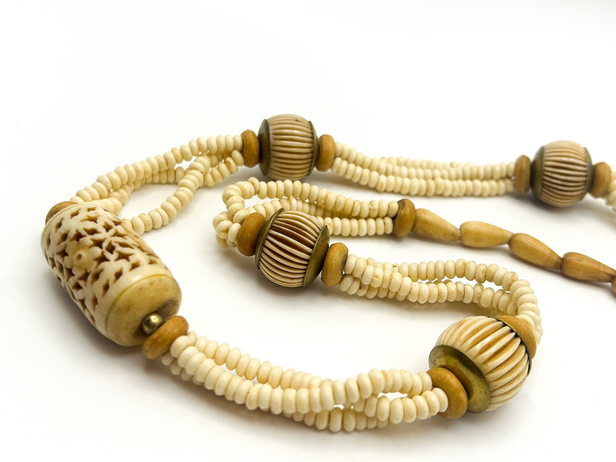 Vintage Carved Organic Material Triple Strand Necklace (Late 1970s–Early 1980s)