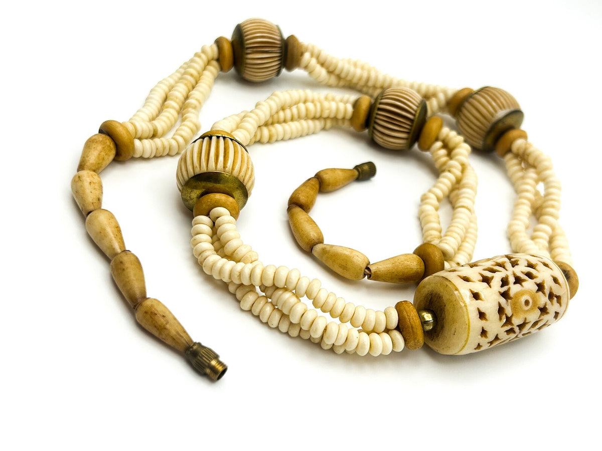 Vintage Carved Organic Material Triple Strand Necklace (Late 1970s–Early 1980s)