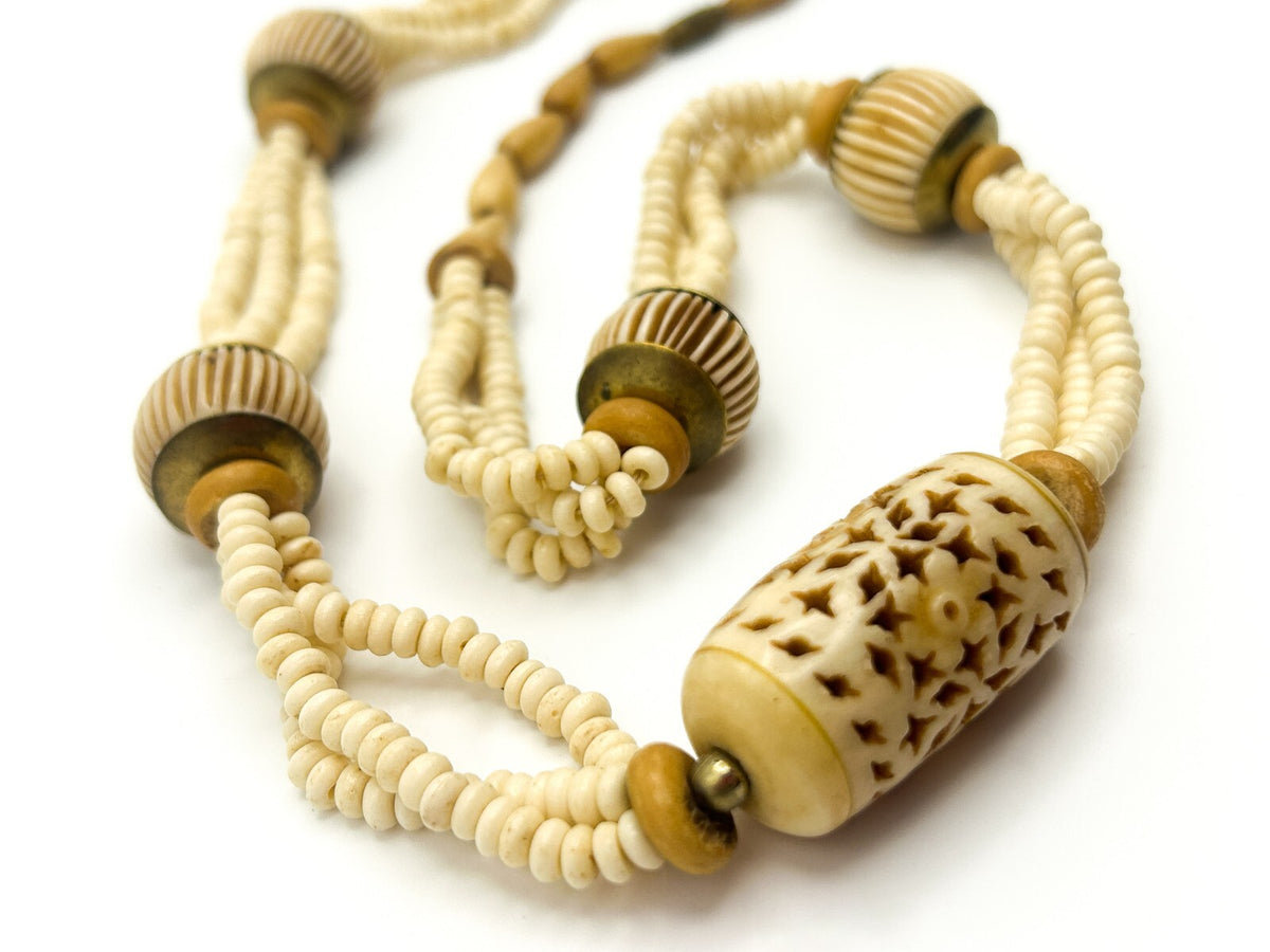 Vintage Carved Organic Material Triple Strand Necklace (Late 1970s–Early 1980s)